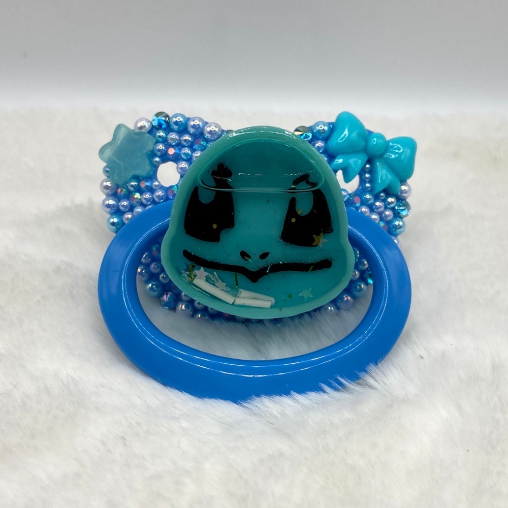 Squirtle liquid shaker paci